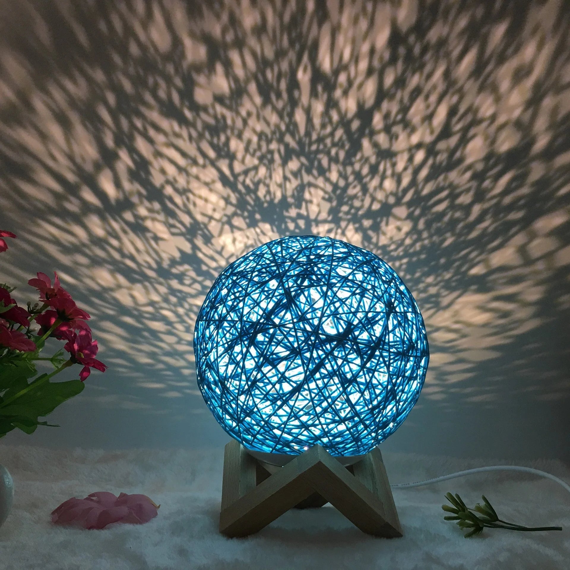 LED rattan table lamp with hand-knit linen shade in various colours