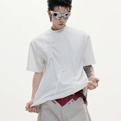 Men's loose fit black cotton T-shirt with textured pleats and asymmetric stitching detail.