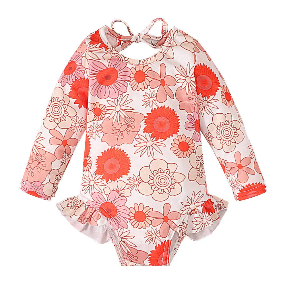 Girl's floral print swimsuit with open back crew neck design in polyester fabric