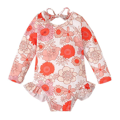 Girl's floral print swimsuit with open back crew neck design in polyester fabric