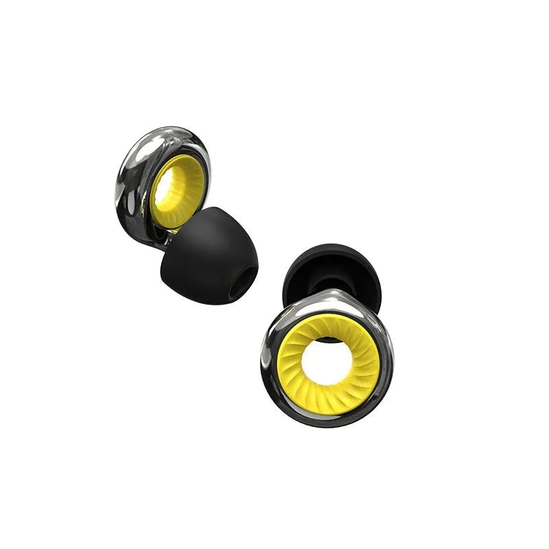 Set of gold-coloured noise reduction earplugs with a storage box and spare ear caps on a white background.