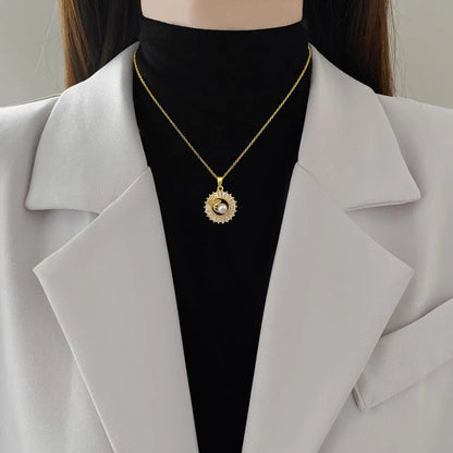 Women's geometric leaves design jewellery set with titanium steel necklace and gold plated stud earrings.