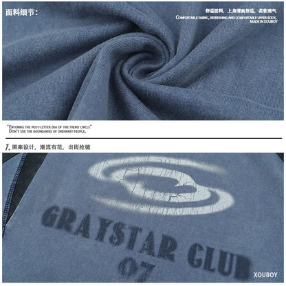 A blue men's hip hop letter print T-shirt with raglan sleeves on a hanger.