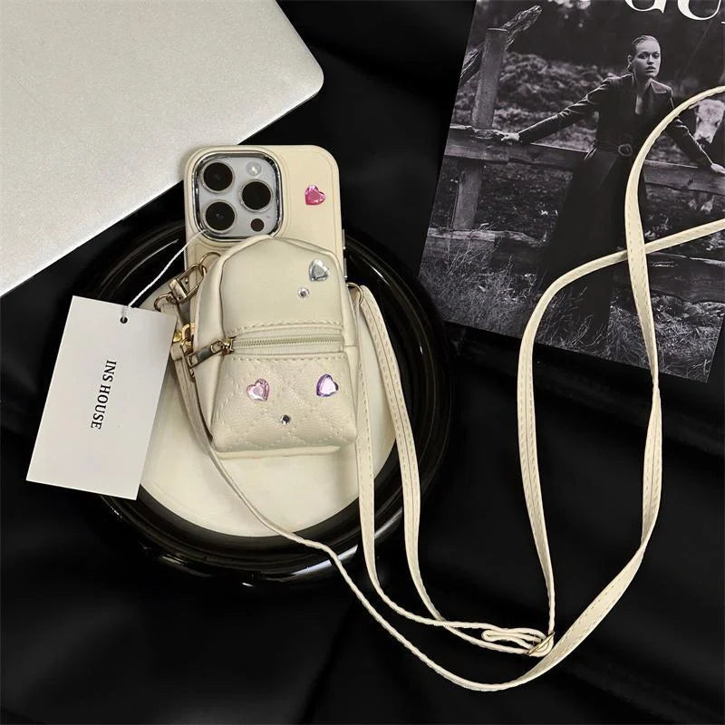 Crossbody Wallet Phone Case for ApplePhone in white, black, and pink with removable strap