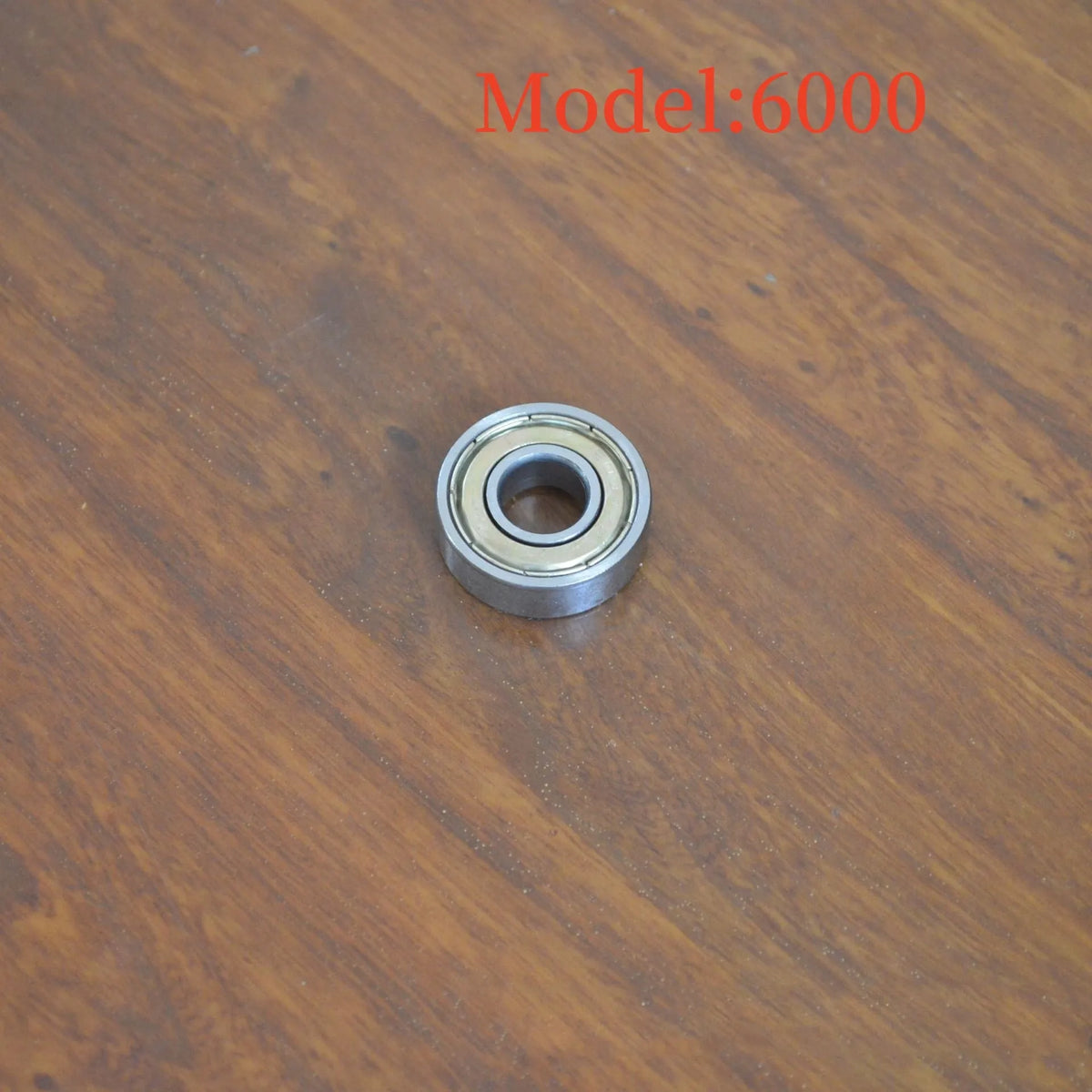 6000ZZ carbon steel ball bearing with 10x26x8mm dimensions and metal shields.