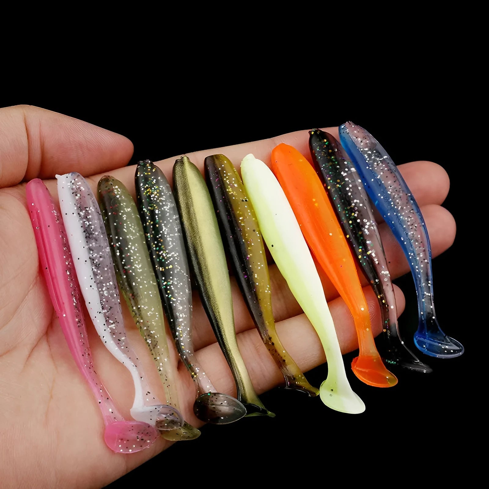 Soft plastic worm lure with a two-tone T tail, shown in one of its 14 colour options.