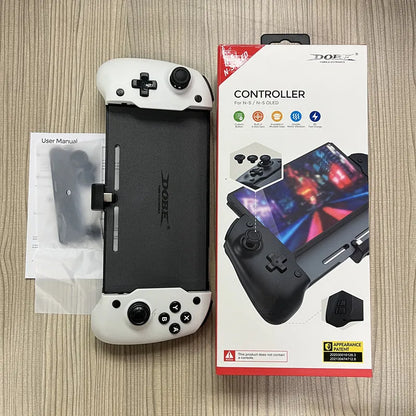 Black and white Nintendo Switch gamepad with console inserted, showing buttons, gyroscope, and Type-C charging port.