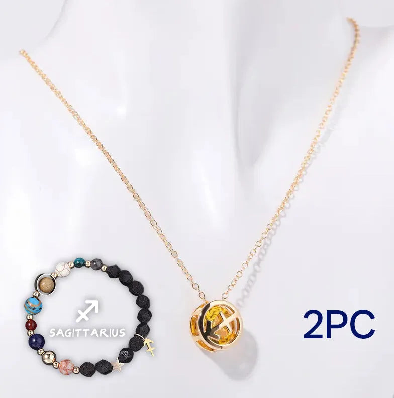 A natural stone beaded necklace and matching bracelet set laid flat, showcasing varied bead colours and textures.