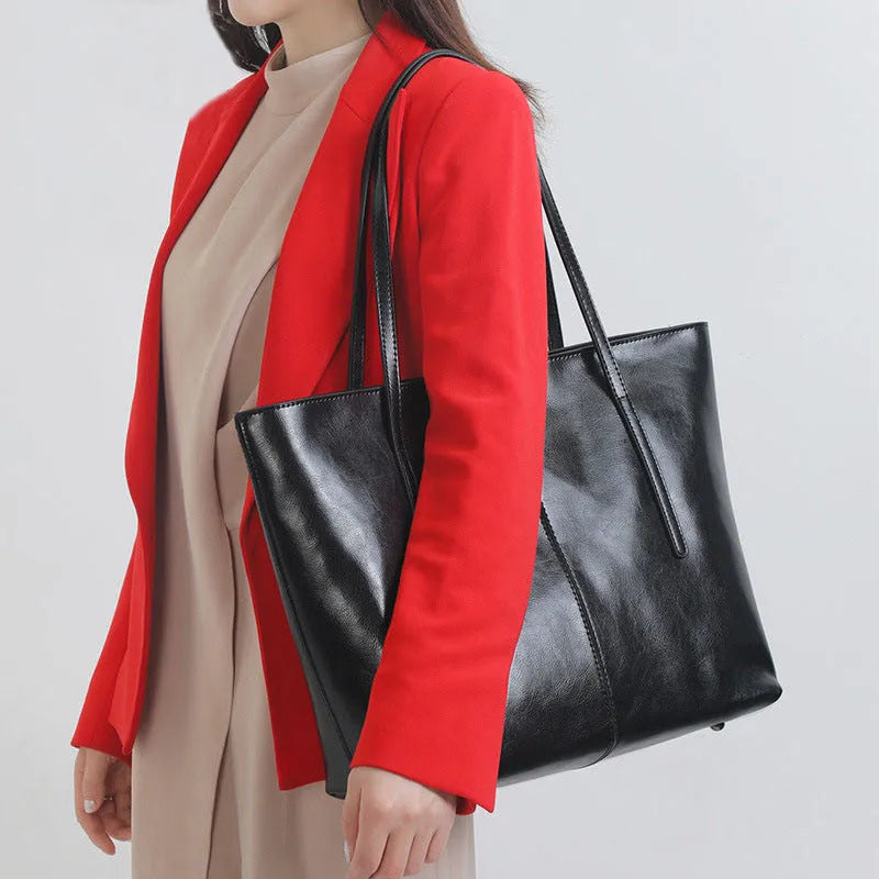 Genuine leather women's shoulder bag in retro style with multiple internal compartments and slit outer pocket