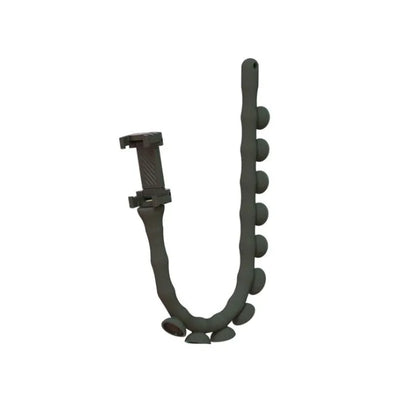 Flexible black rubber phone holder with suction cup mounted on a desk, holding a mobile phone at eye level.