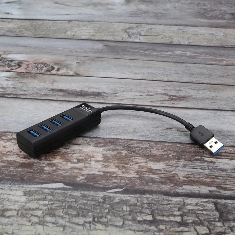 Black USB 3.0 hub with four ports, 30cm cable, and LED connection indicators