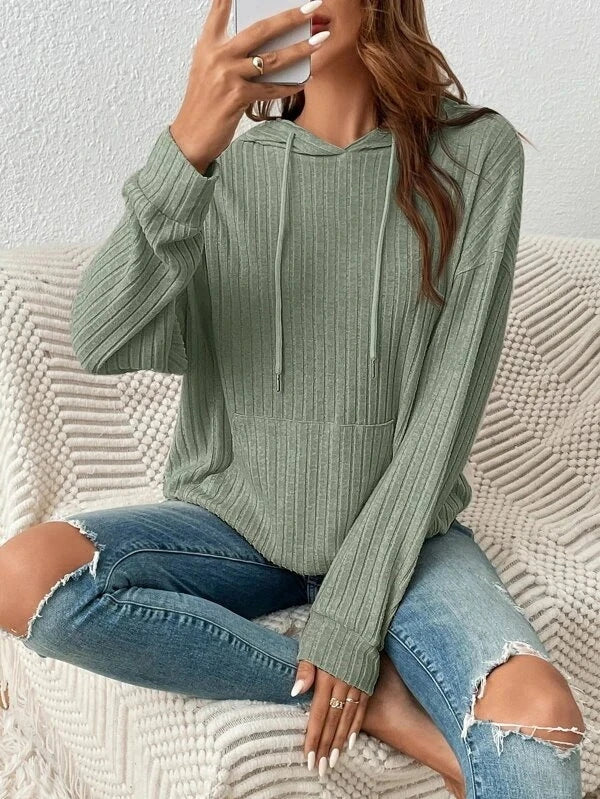 A stylish and comfortable hooded sweatshirt with drawstring and pockets, available in various colors.