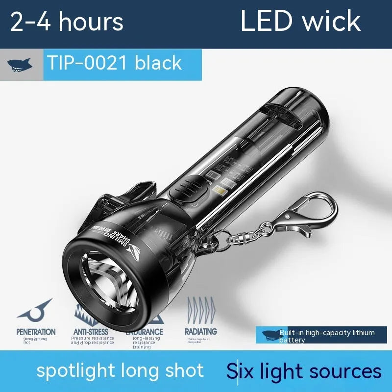 Black plastic USB rechargeable handheld flashlight with charging cable.