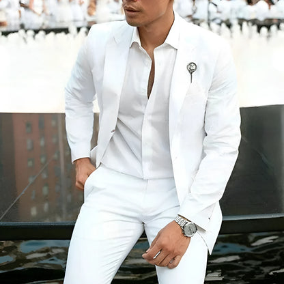 Men's white slim-fit two-piece wedding suit jacket and trousers on a hanger.