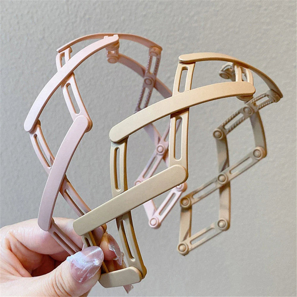 Compact retractable hair band with non-slip teeth grip, available in various colors for versatile styling