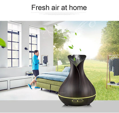 Black USB humidifier with colour-changing LED lights and water mist output