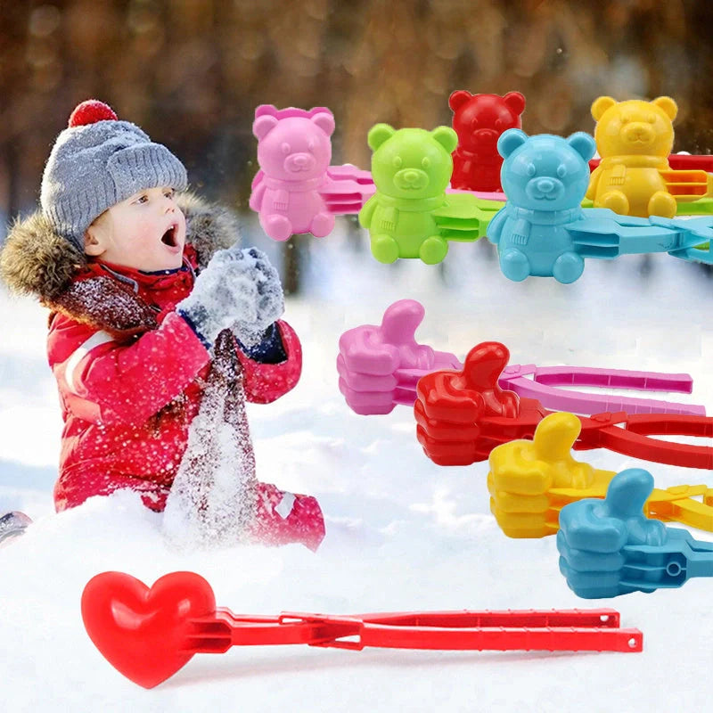 Red heart-shaped snowball maker clip for kids, perfect for winter play