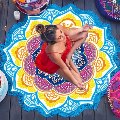 Round floor mat with polygon print and tassel trim, shown in available colours.
