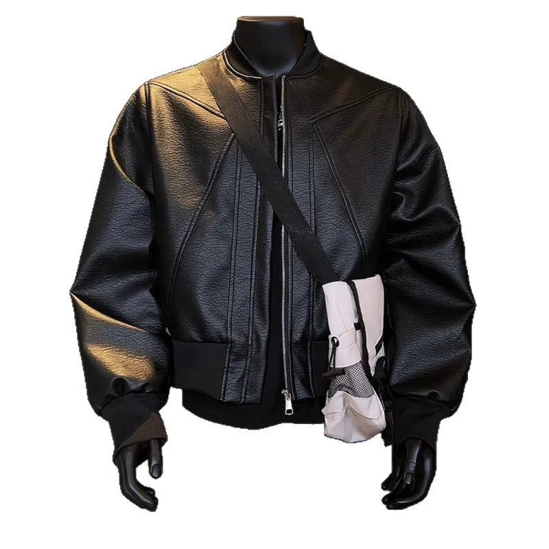 Man wearing a long black PU leather jacket with a litchi grain texture, showing its extended 100cm length and tight fit.