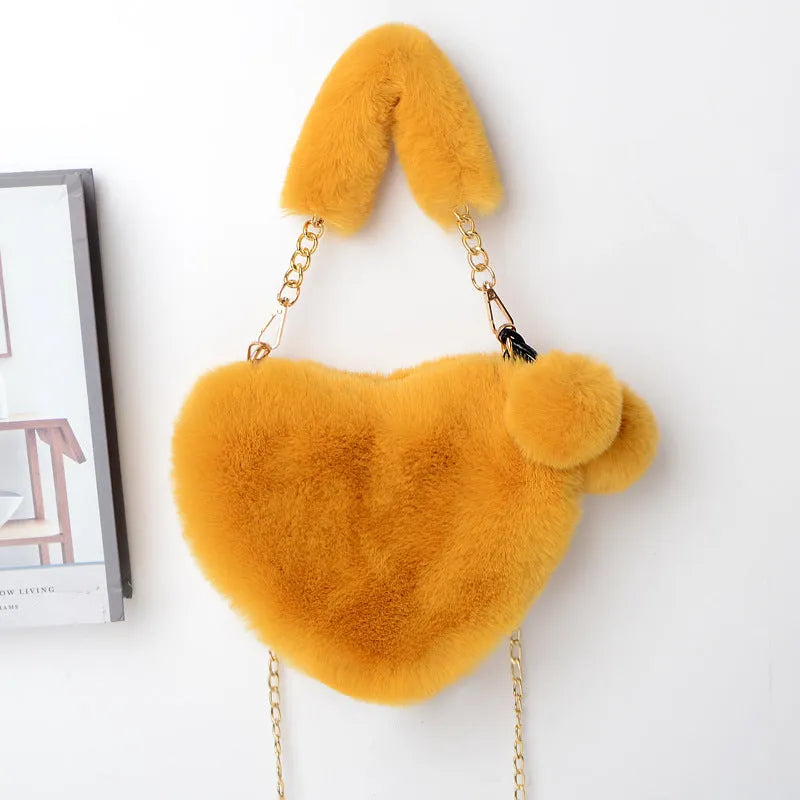 Plush heart-shaped women's handbag in medium size with removable shoulder strap