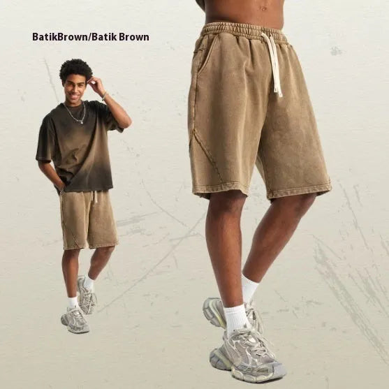 Men's batik washed cotton terry shorts in loose fit with patch craft details