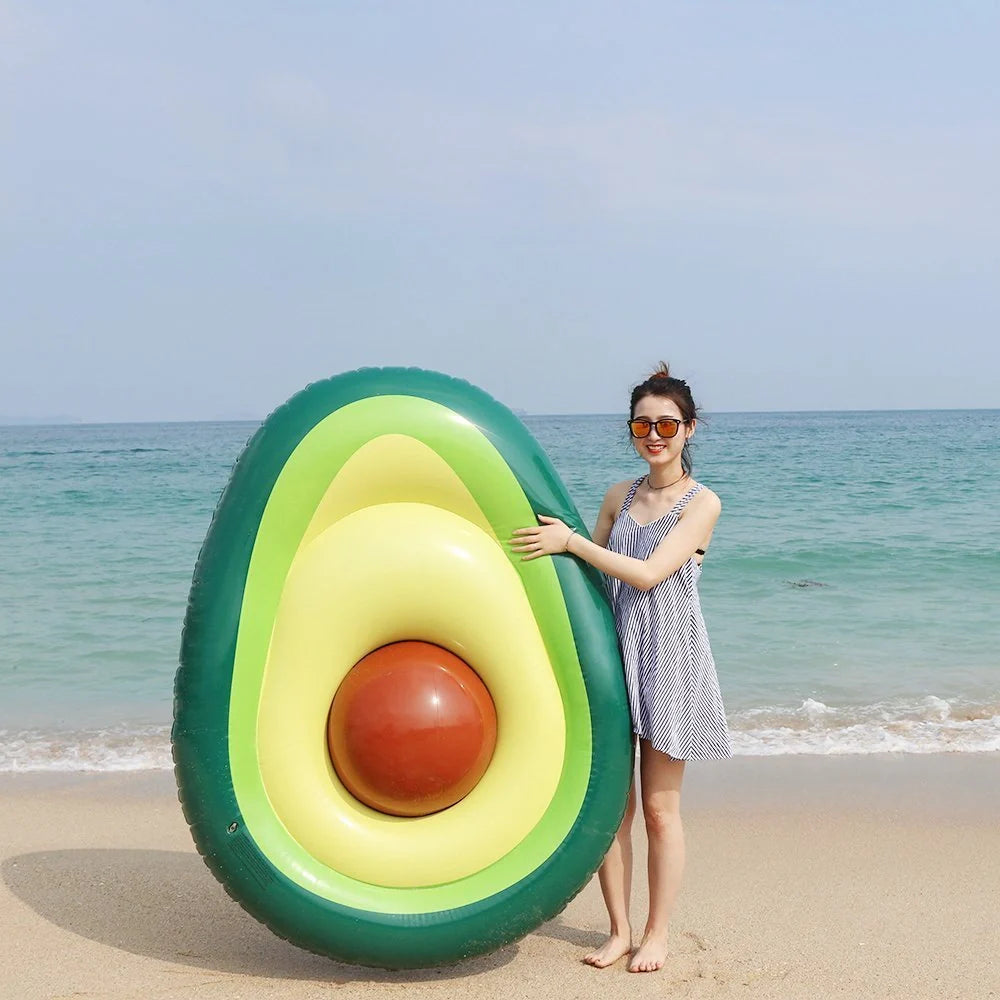 Giant avocado-shaped inflatable pool float for swimming and parties