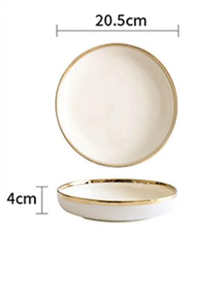 Platinum-coloured porcelain bowl and plate with gold rim, part of a wedding gift tableware set.