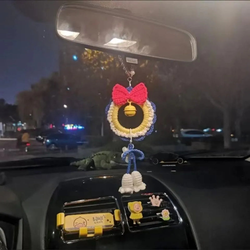 Snow White car hanging handmade yarn weaving plush carhangs finished product or two-piece set with red wind chimes for car decoration and rear view mirror accessory, featuring a soft plush material and a neutral colour palette.
