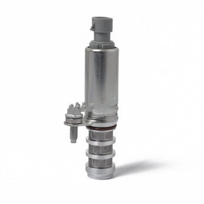 A pair of automotive oil control VVT solenoid valves for Buick and Chevrolet engines.