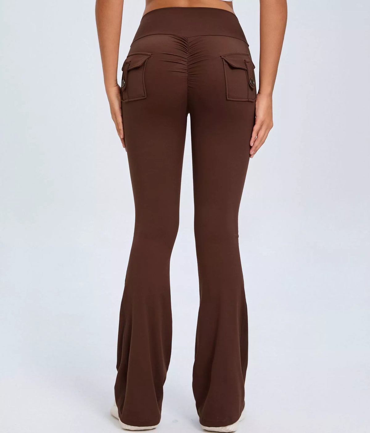 Women's high waist yoga flared pants with pockets and scrunch butt detail in black, brown, and green