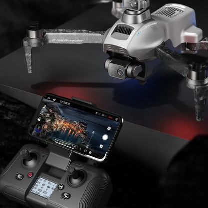 White folding quadcopter drone with camera and obstacle avoidance sensors, remote control, and shoulder bag.