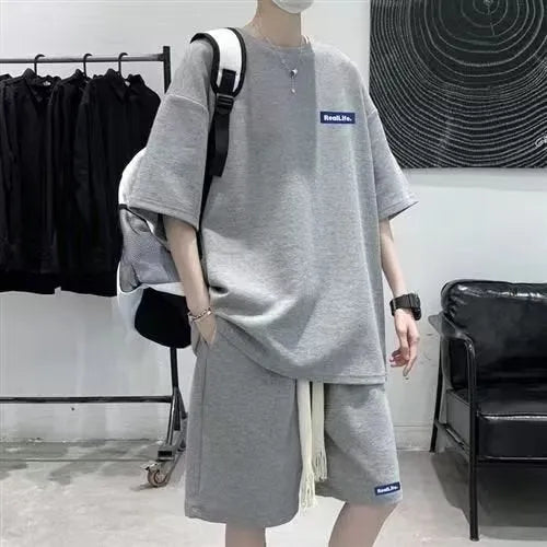 Waffle texture leisure sports suit with short sleeve top and matching shorts