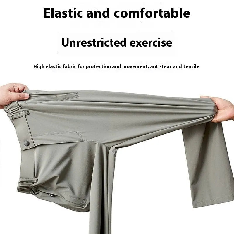 Man wearing black Ice Silk loose-fit casual trousers with an elastic waistband.
