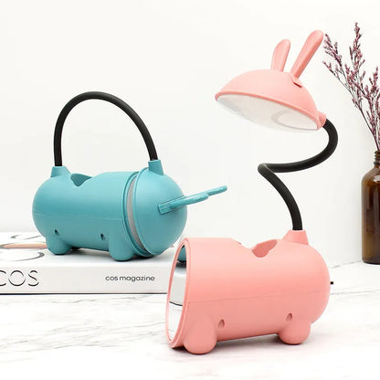 Green desktop table lamp with pen container, measuring 30 cm wide with USB power cable