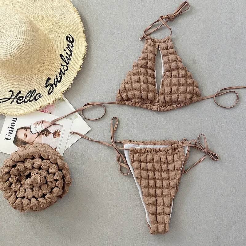 Women's three-piece bikini swimsuit in lace-up seersucker fabric, designed for sports trends and swimming with high elasticity, available in brown seersucker colour in sizes S, M, L.