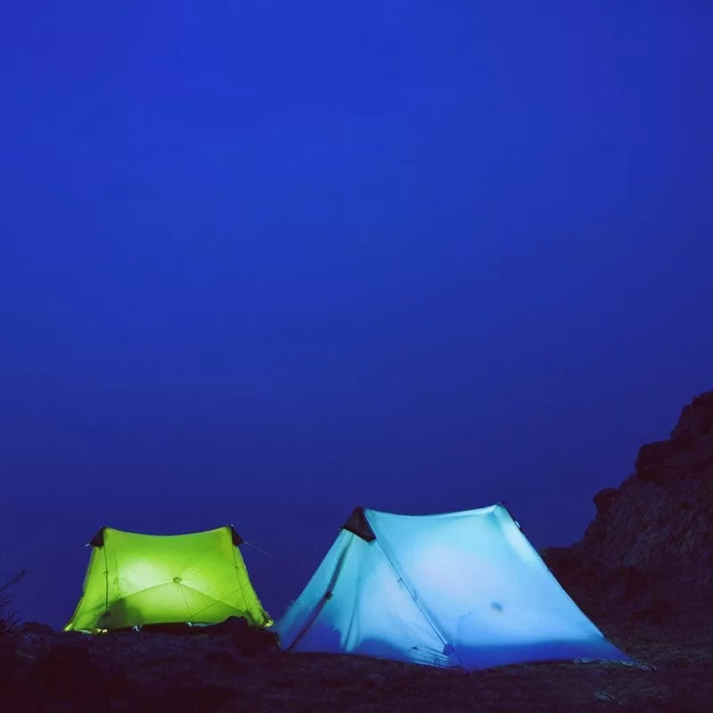 Silicon-coated poleless tent in camouflage green, featuring rainproof design and lightweight aluminum poles