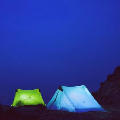 Silicon-coated poleless tent in camouflage green, featuring rainproof design and lightweight aluminum poles