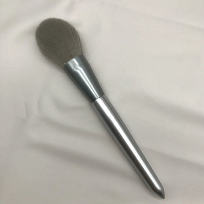 10 makeup brushes with moonlight silver finish and wooden handles beside PU brush bag