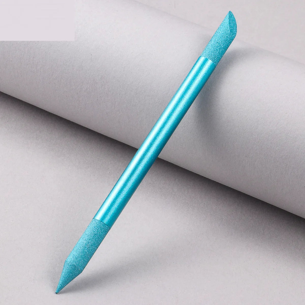 Nano glass nail polishing frotton tool in various solid colours.
