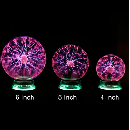 Plasma lightning ball with electrostatic induction showing colourful electrical discharges on glass surface