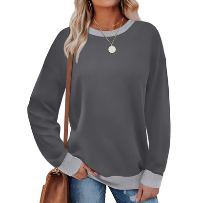 Loose fit striped long sleeve top for women on a hanger, shown in apricot colour.