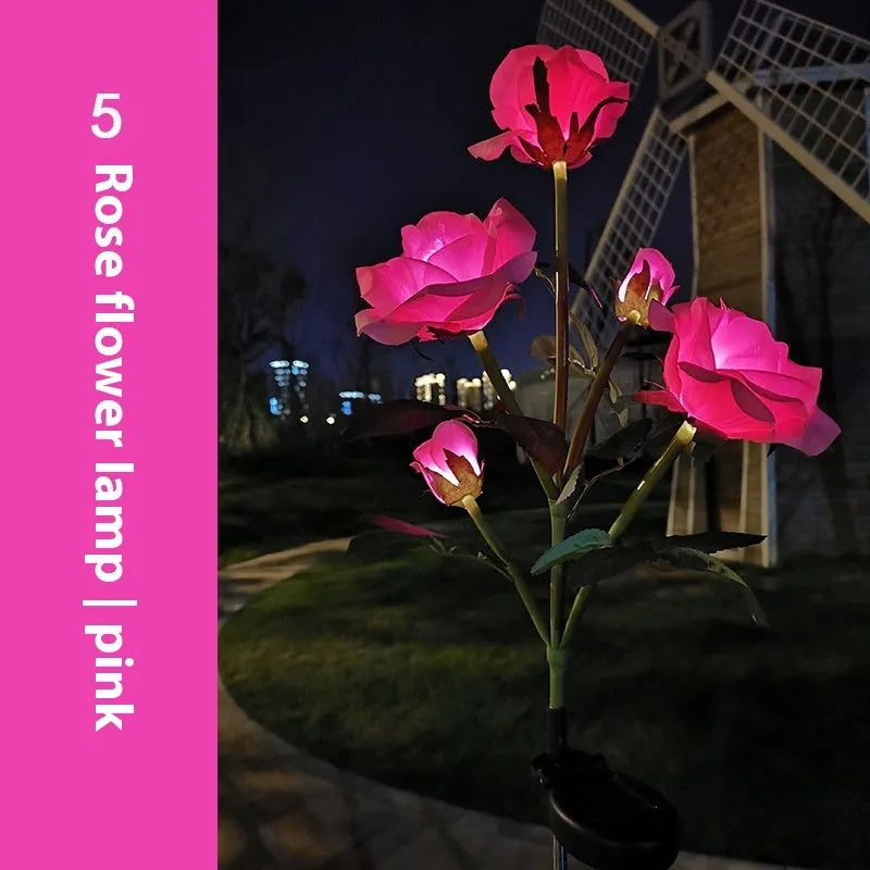Colourful solar-powered LED lawn lamp in a flower shape for garden decoration.