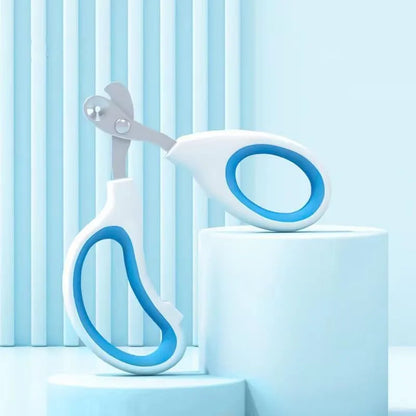 Blue cat nail clippers with a circular safety hole and cushioned non-slip grips on a white background.
