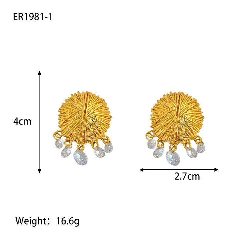 Gold geometric circle drop earrings with electroplated metal construction