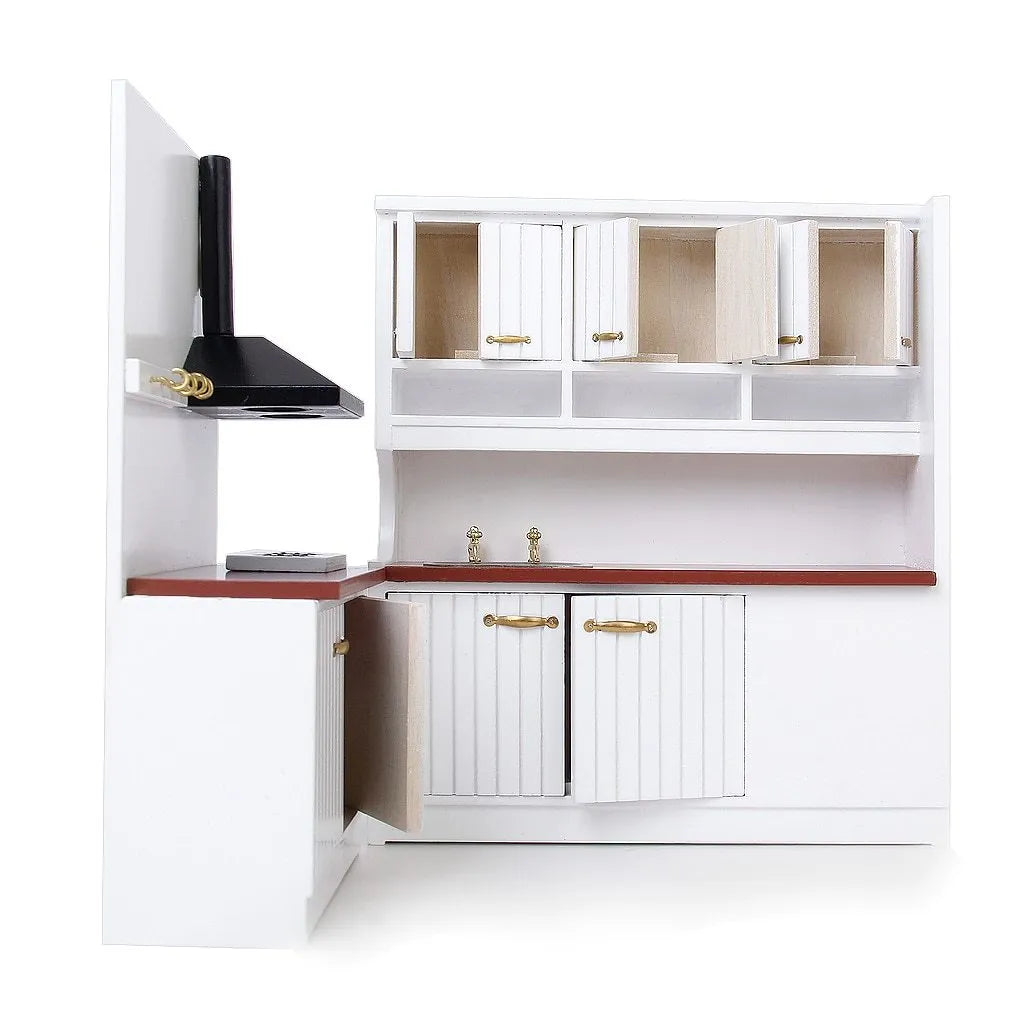 White dollhouse kitchen sink and stove cabinets with working doors and metal handles.