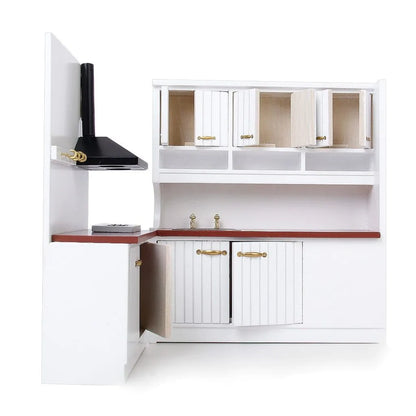 White dollhouse kitchen sink and stove cabinets with working doors and metal handles.
