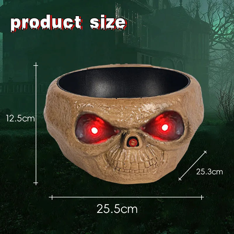 Motion-activated Halloween pumpkin candy bowl with lighted red eyes and skeleton hand in grey colour