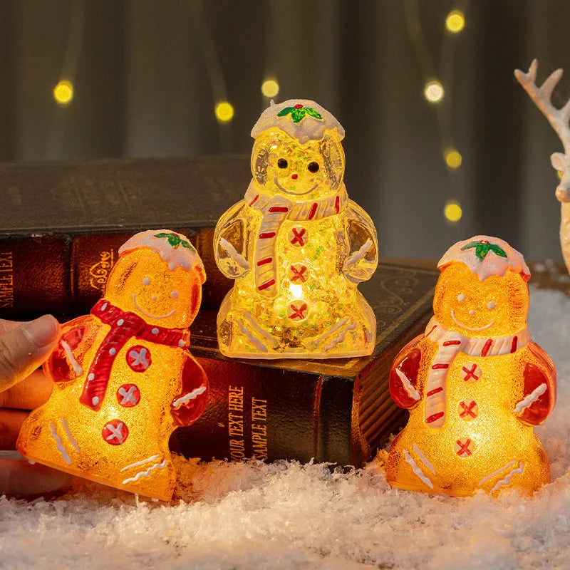 Glowing Christmas gingerbread man and snowman ornaments with LED lights in red, white, and transparent scarf variations