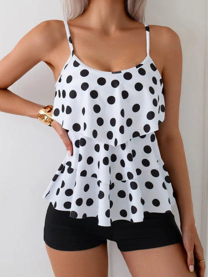 Women's black and white split swimsuit with double-shoulder straps and high-waist briefs