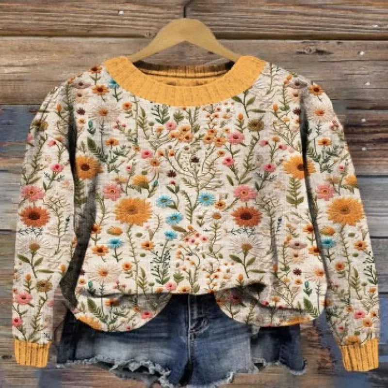 Women's round neck sweater with a colourful digital floral print on polyester fabric.